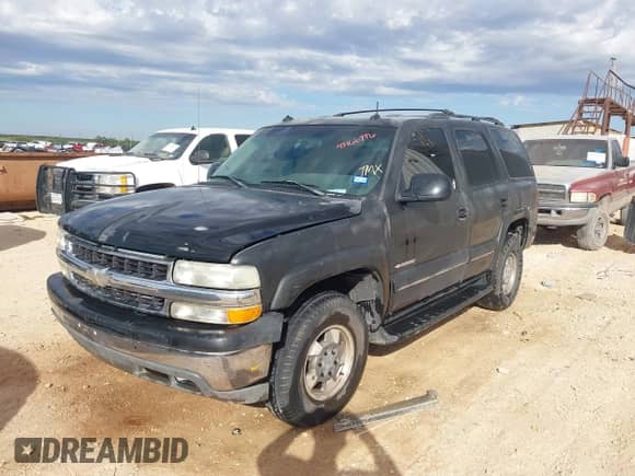 2003 Chevrolet Tahoe LT with VIN 1GNEC13Z63J200108, listed as a IAAI auction lot 43166996 with 243,443 mi miles and . Bid and sale history available at DreamBid. Image 2.