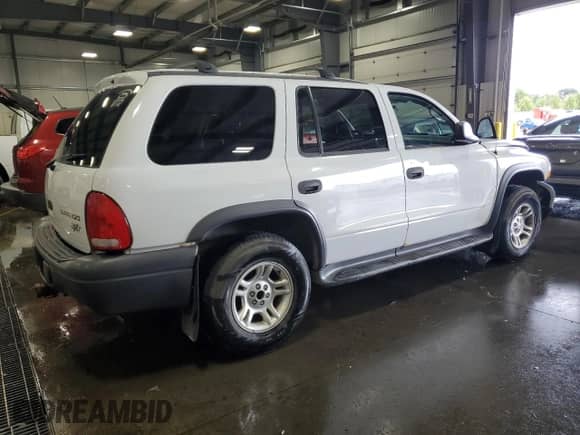 2003 Dodge Durango Sport z VIN 1D4HS38N33F515349, wystawiony jako Copart lot #70510585 z przebiegiem 215 693 mil mil oraz Szkoda całkowita • Salvage title. Historia ofert i sprzedaży dostępna na DreamBid. Obrazek 3.