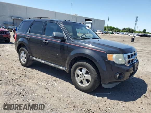 2011 Ford Escape XLT with VIN 1FMCU9D71BKB73526, listed as a Copart auction lot 67264345 with 213,185 mi miles and Salvage title. Bid and sale history available at DreamBid. Image 4.