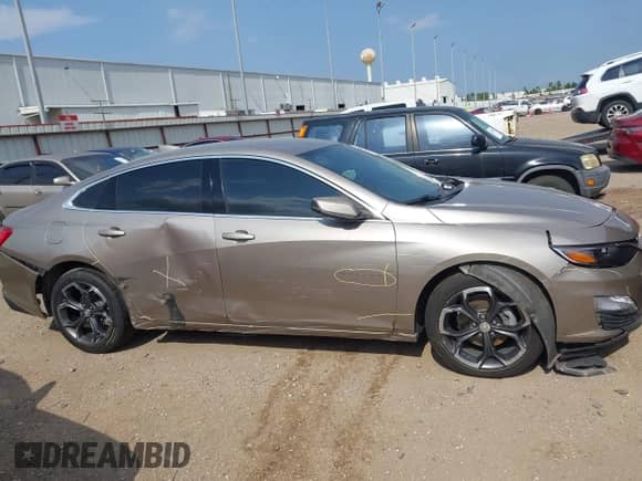 2022 Chevrolet Malibu LT z VIN 1G1ZD5ST7NF198444, wystawiony jako IAAI lot #42888930 z przebiegiem Nie podano mil oraz . Historia ofert i sprzedaży dostępna na DreamBid. Obrazek 14.