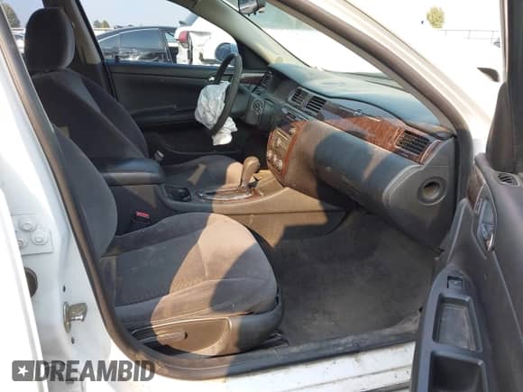 2013 Chevrolet Impala LS with VIN 2G1WF5E35D1240348, listed as a IAAI auction lot 43131336 with 137,558 mi miles and . Bid and sale history available at DreamBid. Image 5.