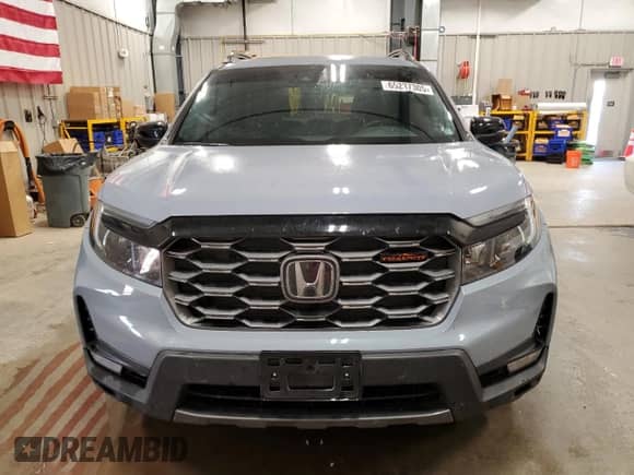 2022 Honda Passport TrailSport with VIN 5FNYF8H61NB028777, listed as a Copart auction lot 65237305 with 34,105 mi miles and Salvage title. Bid and sale history available at DreamBid. Image 5.