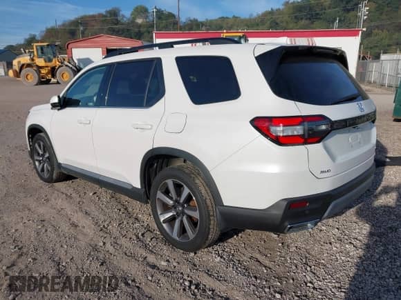 2025 Honda Pilot Elite with VIN 5FNYG1H81SB025573, listed as a IAAI auction lot 43314122 with 20,404 mi miles and . Bid and sale history available at DreamBid. Image 3.