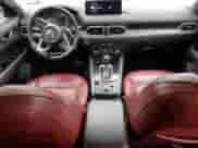 2023 Mazda CX-5 S Carbon Edition z VIN JM3KFBCM4P0111590, wystawiony jako Copart lot #80024545 z przebiegiem 81 621 mil mil oraz Nie do naprawy • Non repairable. Historia ofert i sprzedaży dostępna na DreamBid. Obrazek 8.