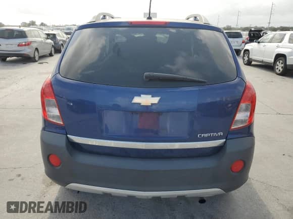2013 Chevrolet Captiva Sport LS with VIN 3GNAL2EK9DS574054, listed as a Copart auction lot 78574134 with 239,388 mi miles and Salvage title. Bid and sale history available at DreamBid. Image 6.