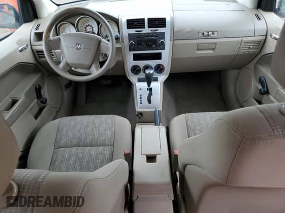 2009 Dodge Caliber SE with VIN 1B3HB28AX9D152123, listed as a Copart auction lot 67595245 with 108,562 mi miles and Salvage title. Bid and sale history available at DreamBid. Image 8.