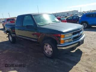 1997 Chevrolet Silverado 1500 with VIN 2GCEK19R5V1180353, listed as a IAAI auction lot 43385908 with 231,909 mi miles and . Bid and sale history available at DreamBid. Image 1.