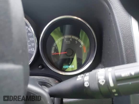 2010 Dodge Caliber SXT with VIN 1B3CB4HA1AD552470, listed as a IAAI auction lot 43497443 with 108,468 mi miles and . Bid and sale history available at DreamBid. Image 7.