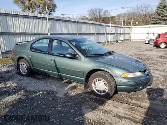 1996 Dodge Stratus with VIN 1B3EJ46XXTN285619, listed as a Copart auction lot 78267884 with Not provided miles and Salvage title. Bid and sale history available at DreamBid. Image 4.