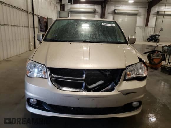 2013 Dodge Grand Caravan Crew with VIN 2C4RDGDG6DR700029, listed as a Copart auction lot 69057705 with 64,797 mi miles and Salvage title. Bid and sale history available at DreamBid. Image 5.