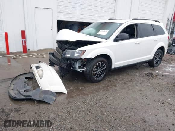 2018 Dodge Journey SE with VIN 3C4PDCAB9JT363759, listed as a IAAI auction lot 41262025 with 145,471 mi miles and . Bid and sale history available at DreamBid. Image 2.