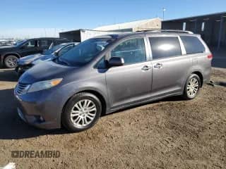 2013 Toyota Sienna XLE AAS with VIN 5TDYK3DCXDS365887, listed as a Copart auction lot 90438455 with 279,518 mi miles and Clean title. Bid and sale history available at DreamBid. Image 1.