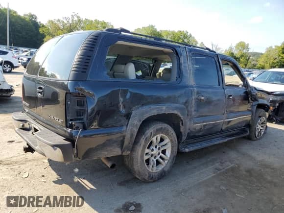 2000 Chevrolet Suburban LT z VIN 3GNFK16T2YG200100, wystawiony jako Copart lot #70187684 z przebiegiem Nie podano mil oraz Szkoda całkowita • Salvage title. Historia ofert i sprzedaży dostępna na DreamBid. Obrazek 3.