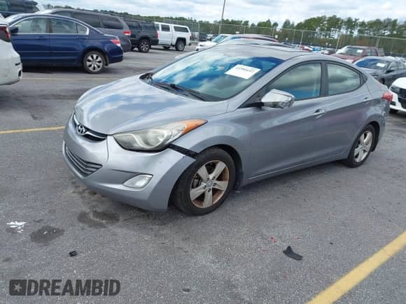 2013 Hyundai Elantra GLS z VIN KMHDH4AE9DU523071, wystawiony jako IAAI lot #43586642 z przebiegiem 176 733 mil mil oraz . Historia ofert i sprzedaży dostępna na DreamBid. Obrazek 2.