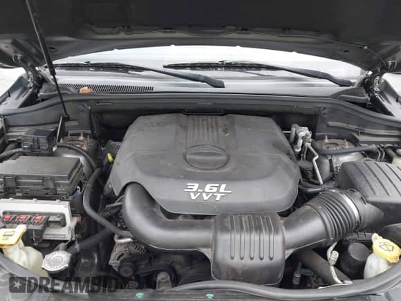 2012 Jeep Grand Cherokee Laredo with VIN 1C4RJFAG3CC272631, listed as a IAAI auction lot 43291923 with 168,220 mi miles and . Bid and sale history available at DreamBid. Image 10.