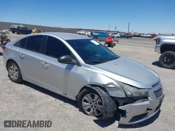 2014 Chevrolet Cruze LS with VIN 1G1PB5SG7E7480500, listed as a IAAI auction lot 42632537 with 143,001 mi miles and . Bid and sale history available at DreamBid. Image 1.