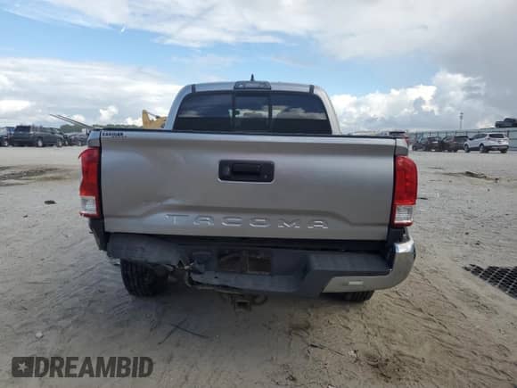 2017 Toyota Tacoma SR5 с VIN 5TFAX5GN4HX095311, выставлен на аукционе Copart как лот 82027495 с пробегом 126 042 миль миль и Списание • Salvage title. История ставок и продаж доступна на DreamBid. Изображение 6.