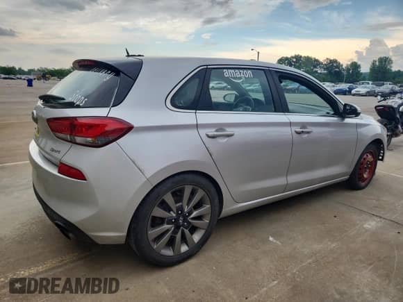 2018 Hyundai Elantra Sport с VIN KMHH55LCXJU020785, выставлен на аукционе Copart как лот 61010705 с пробегом 186 752 миль миль и Списание • Salvage title. История ставок и продаж доступна на DreamBid. Изображение 3.