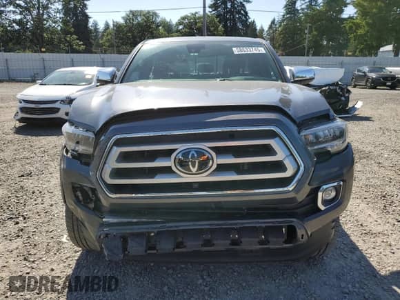 2022 Toyota Tacoma Limited with VIN 3TMGZ5ANXNM515023, listed as a Copart auction lot 58633745 with 23,668 mi miles and Salvage title. Bid and sale history available at DreamBid. Image 5.