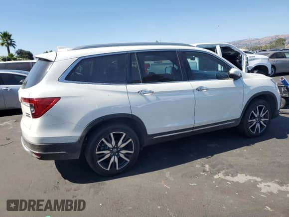 2019 Honda Pilot Touring 8-Passenger z VIN 5FNYF6H94KB071097, wystawiony jako Copart lot #69450235 z przebiegiem 104 376 mil mil oraz Szkoda całkowita • Salvage title. Historia ofert i sprzedaży dostępna na DreamBid. Obrazek 3.
