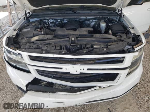 2018 Chevrolet Tahoe Premier with VIN 1GNSKCKJXJR251316, listed as a Copart auction lot 61205895 with 134,233 mi miles and Salvage title. Bid and sale history available at DreamBid. Image 12.