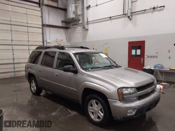 2002 Chevrolet TrailBlazer EXT LT z VIN 1GNET16SX26104756, wystawiony jako IAAI lot #42460772 z przebiegiem 178 091 mil mil oraz . Historia ofert i sprzedaży dostępna na DreamBid. Obrazek 1.