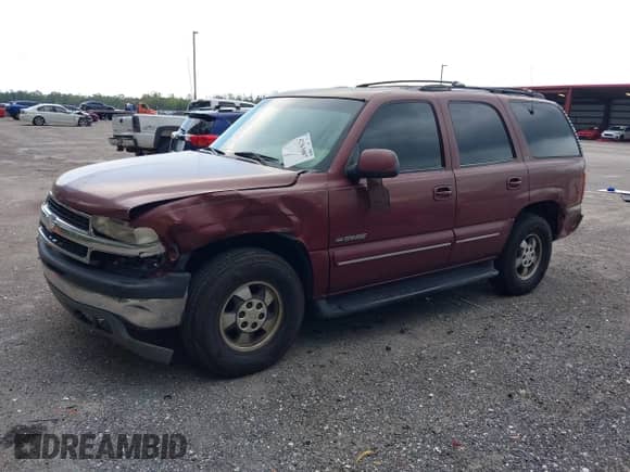 2001 Chevrolet Tahoe LS with VIN 1GNEC13TX1J205658, listed as a IAAI auction lot 42363087 with 288,059 mi miles and . Bid and sale history available at DreamBid. Image 2.