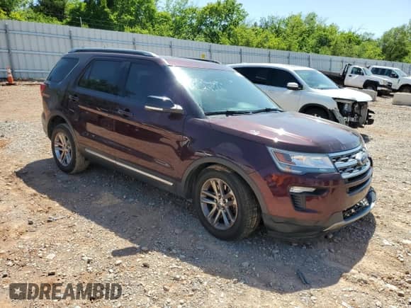 2018 Ford Explorer XLT with VIN 1FM5K7D88JGC25277, listed as a Copart auction lot 56957875 with 97,215 mi miles and Salvage title. Bid and sale history available at DreamBid. Image 4.