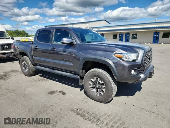 2021 Toyota Tacoma SR with VIN 3TMCZ5ANXMM439252, listed as a Copart auction lot 70420565 with 60,463 mi miles and Salvage title. Bid and sale history available at DreamBid. Image 4.