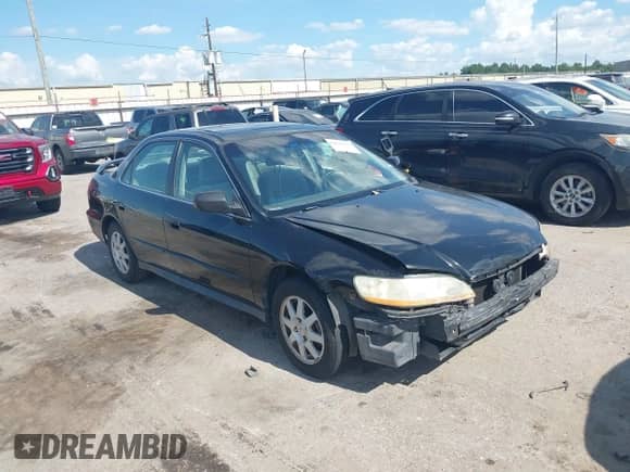 2002 Honda Accord SE z VIN 1HGCG66852A034121, wystawiony jako IAAI lot #42820792 z przebiegiem 220 120 mil mil oraz . Historia ofert i sprzedaży dostępna na DreamBid. Obrazek 1.