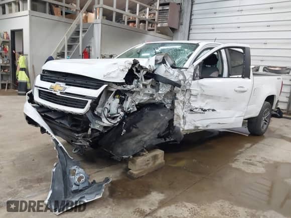 2020 Chevrolet Colorado 4WD Work Truck with VIN 1GCGTBEN1L1160859, listed as a IAAI auction lot 42605808 with 61,852 mi miles and . Bid and sale history available at DreamBid. Image 2.