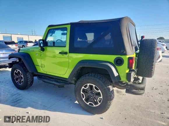 2013 Jeep Wrangler Rubicon 10th Anniversary with VIN 1C4BJWCG6DL558909, listed as a Copart auction lot 61067255 with 136,879 mi miles and Clean title. Bid and sale history available at DreamBid. Image 2.