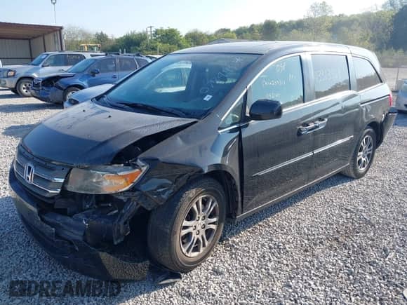 2013 Honda Odyssey EX-L with VIN 5FNRL5H67DB078495, listed as a IAAI auction lot 43313569 with 133,035 mi miles and . Bid and sale history available at DreamBid. Image 2.