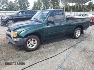 1999 Toyota Tacoma with VIN 4TANL42N6XZ558045, listed as a Copart auction lot 80556925 with 161,665 mi miles and Salvage title. Bid and sale history available at DreamBid. Image 1.