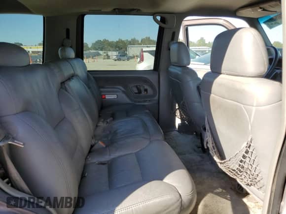 1998 Chevrolet Tahoe z VIN 1GNEK13R5WJ371083, wystawiony jako Copart lot #76305624 z przebiegiem 186 100 mil mil oraz Czysty tytuł • Clean title. Historia ofert i sprzedaży dostępna na DreamBid. Obrazek 11.