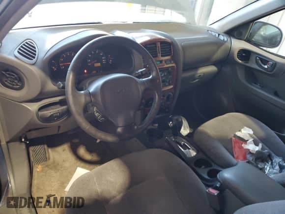 2003 Hyundai Santa Fe GLS z VIN KM8SC73D23U373492, wystawiony jako Copart lot #75107684 z przebiegiem 205 655 mil mil oraz Szkoda całkowita • Salvage title. Historia ofert i sprzedaży dostępna na DreamBid. Obrazek 8.