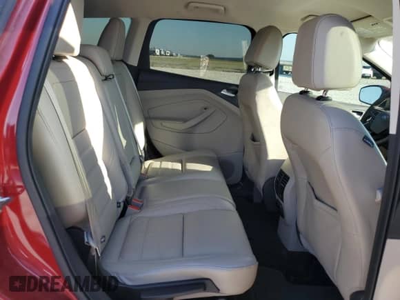 2017 Ford Escape Titanium with VIN 1FMCU0J97HUE54115, listed as a Copart auction lot 86779465 with 68,875 mi miles and Salvage title. Bid and sale history available at DreamBid. Image 11.