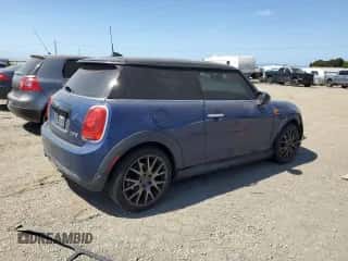 2018 MINI Hardtop Cooper with VIN WMWXP5C59J2G62969, listed as a Copart auction lot 58229175 with 86,214 mi miles and Salvage title. Bid and sale history available at DreamBid. Image 3.