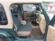 1999 Jeep Wrangler Sahara z VIN 1J4FY49S5XP482037, wystawiony jako IAAI lot #42341723 z przebiegiem 161 081 mil mil oraz . Historia ofert i sprzedaży dostępna na DreamBid. Obrazek 5.