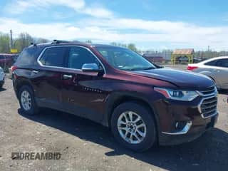 2018 Chevrolet Traverse LT Cloth z VIN 1GNEVGKW9JJ160415, wystawiony jako IAAI lot #42157331 z przebiegiem 101 144 mil mil oraz . Historia ofert i sprzedaży dostępna na DreamBid. Obrazek 1.