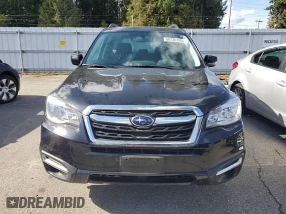 2018 Subaru Forester Premium z VIN JF2SJAEC3JH588592, wystawiony jako Copart lot #84730205 z przebiegiem 75 529 mil mil oraz Szkoda całkowita • Salvage title. Historia ofert i sprzedaży dostępna na DreamBid. Obrazek 5.