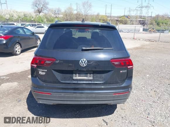 2021 Volkswagen Tiguan S with VIN 3VV0B7AXXMM040752, listed as a IAAI auction lot 41988353 with 51,757 mi miles and . Bid and sale history available at DreamBid. Image 16.