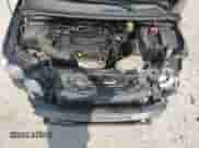 2014 Chevrolet Sonic LT z VIN 1G1JD6SB8E4153079, wystawiony jako Copart lot #70496614 z przebiegiem 153 743 mil mil oraz Czysty tytuł • Clean title. Historia ofert i sprzedaży dostępna na DreamBid. Obrazek 11.