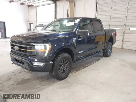 2023 Ford F-150 XL с VIN 1FTFW1E54PFA80722, выставлен на аукционе IAAI как лот 42634159 с пробегом 127 867 миль миль и . История ставок и продаж доступна на DreamBid. Изображение 18.