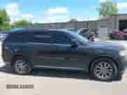 2014 Dodge Durango SXT with VIN 1C4RDJAG7EC561962, listed as a IAAI auction lot 42771485 with 179,140 mi miles and . Bid and sale history available at DreamBid. Image 13.