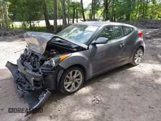 2017 Hyundai Veloster Value Edition z VIN KMHTC6AD6HU308346, wystawiony jako IAAI lot #43135955 z przebiegiem 97 377 mil mil oraz . Historia ofert i sprzedaży dostępna na DreamBid. Obrazek 2.