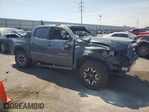 2020 Toyota Tacoma SR5 with VIN 3TMCZ5AN6LM306812, listed as a Copart auction lot 67223955 with 90,130 mi miles and Salvage title. Bid and sale history available at DreamBid. Image 4.