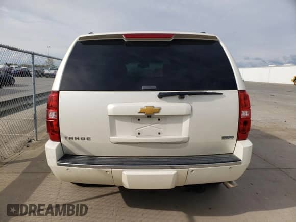 2012 Chevrolet Tahoe LTZ z VIN 1GNSCCE04CR213048, wystawiony jako Copart lot #51284685 z przebiegiem 192 733 mil mil oraz Czysty tytuł • Clean title. Historia ofert i sprzedaży dostępna na DreamBid. Obrazek 6.