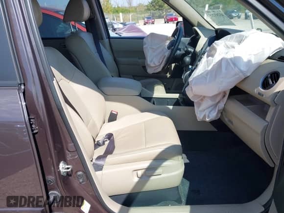 2013 Honda Pilot EX-L with VIN 5FNYF4H57DB082731, listed as a IAAI auction lot 43203205 with 96,017 mi miles and . Bid and sale history available at DreamBid. Image 5.