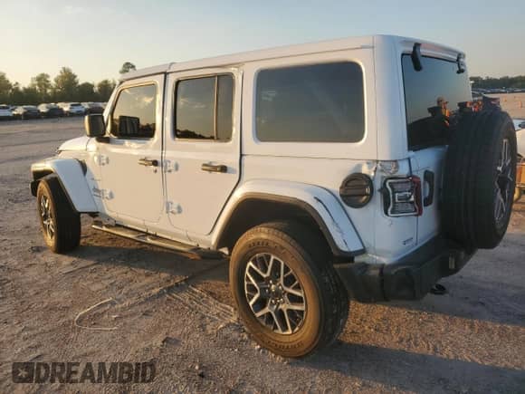 2024 Jeep Wrangler Sahara с VIN 1C4PJXEG1RW262694, выставлен на аукционе Copart как лот 90266305 с пробегом 12 760 миль миль и Списание • Salvage title. История ставок и продаж доступна на DreamBid. Изображение 2.